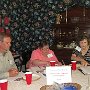 Kaye at the table with Carol Lucas and Rick Stopfer